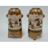 A good pair of Japanese Meiji period Satsuma cylindrical miniature vases, the body with twin lion