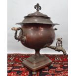 A 19th century copper tea urn, height 44cm.