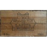 Chateau Lafite-Rothschild 1984, twelve bottles offered in original wooden case and tissues.