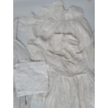 Two antique cotton and lace christening gowns, together with four cotton baby's blouses.