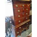 An 18th century English walnut chest on stand fitted six drawers to the upper section, four to the