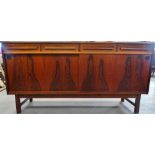 A Danish rosewood and oak mid 20th century sideboard with Danish furniture maker's control stamp,