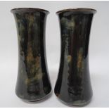 A pair of Royal Doulton stoneware cylindrical vases with dark green mottled ground No.7733D,