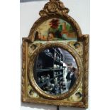 An unusual wall mirror formed from a longcase clock face, fitted a convex mirror with gilt gesso