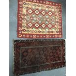 A kelim rug, 127 x 100cm, together with another hand knotted middle eastern rug, 141 x 97cm (2).