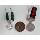 Three foreign medals, including a Pakistan and Bangladesh Resolution medal, a French Collective