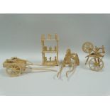 Four 19th century carved and turned bone miniature items, possibly Napoleonic prisoner of war, a