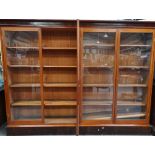 A large mahogany and glazed four door bookcase in late 19th century style, width 240cm, height