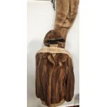 A ladies fur jacket by Mertons Altrincham, together with a fur stole, hat and scarf and other