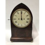 An early 19th century mahogany and ebony strung bracket clock of lancet form with twin fusee