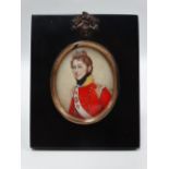 An early 20th century watercolour oval miniature on ivory depicting a British red coated officer,