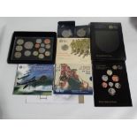 A Royal Mint 2011 proof coin set, including The William and Katherine crown, together with two £5
