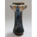 A Doulton Lambeth Art Nouveau vase, the bulbous moulded top with stylised frond design upon a