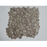 A quantity of three pence silver and .500 silver coins, weight 140g approx.