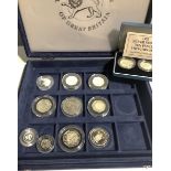 A collection of eleven silver proof coins, including a cased set of 1992 10p coins.
