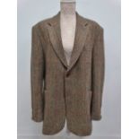 A gentlemans tweed jacket, size large.