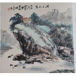 A 20th century Chinese large ink scroll painted with a mountainous river landscape and