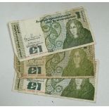 Three Bank of Ireland one pound notes.
