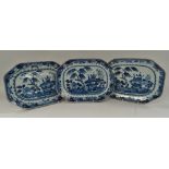 A set of three Chinese export blue and white underglaze oblong serving dishes, decorated with a
