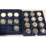 A collection of nineteen silver proof commemorative crowns and £5 coins.