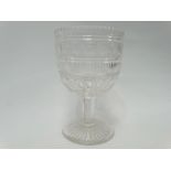 A 19th century cut glass pedestal vase, the bowl with bands of circles and flutes over a hexagonal