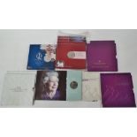 Eleven commemorative £5 coin sets, including Diamond Wedding, Diamond Jubilee etc.