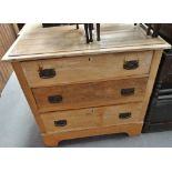 A late 19th century stripped pine chest of three long drawers, width 84cm.