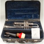 An Elkhart silver plated trumpet 'Buescher Aristocrat Custom Built', within original case with