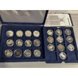 A collection of twenty two silver proof crown and £5 coins, including five East Caribbean States $10