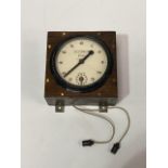 A WWII era RAF dark room clock in oak case.