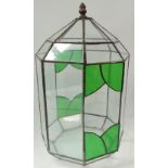 A leaded clear and green glass octagonal terrarium, height 41cm.