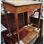 A mahogany scholar's desk with lift up lid and H stretcher.