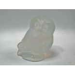 A Lalique opalescent glass owl paperweight, inscribed 'Lalique France', height 5.5cm.