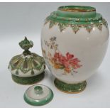 An early 20th century Royal Worcester ivory ground pot pourri vase, lid and cover, shape No.2048,