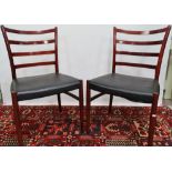 A set of six Danish rosewood dining chairs by Schou Andersen with upholstered seats and quadruple