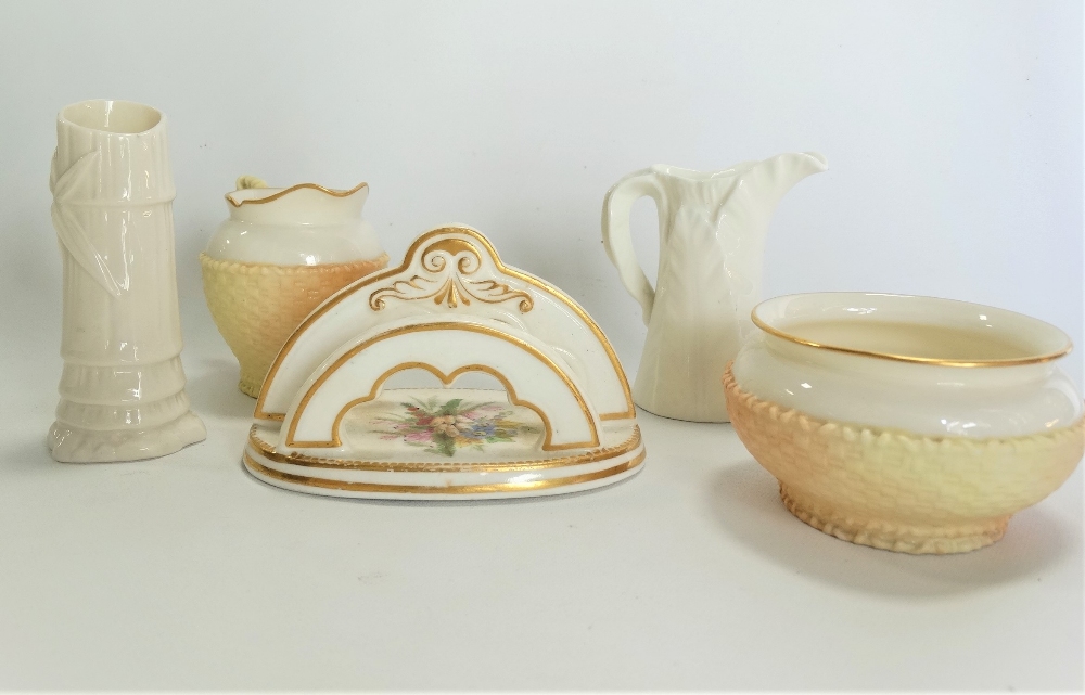 A 19th century Royal Worcester porcelain two section toast rack, foliate spray painted and with gilt