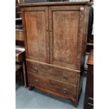 A 19th century small oak linen press with two blind doors over two drawers, width 98cm.