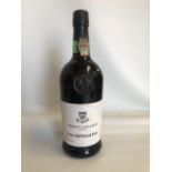 A bottle of Trinity College Fine Old Wood Port by Russell Mellor & Company Limited.
