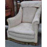 A hardwood framed Edwardian salon armchair.