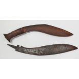 A kukri knife with wooden carved handle, together with a kukri blade (lacks handle) (2).