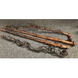 Four Victorian rustic naive natural wood walking canes in hawthorne and blackthorn.