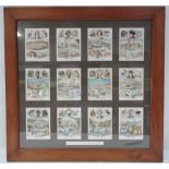 A collection of twelve W.D. & H.O. Wills cigarette cards 'The British Empire', in later frame.