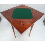 An Edwardian mahogany and inlaid envelope card table.