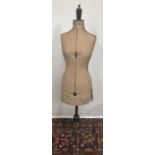 An early 20th century dressmaker's adjustable dummy upon stand, bust 32-39 and stencilled 'Childaw