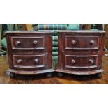 A pair of miniature mahogany two drawer chests (AF).