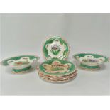 A 19th century porcelain part dessert set, comprising two comports and six plates, each with