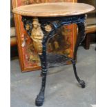 A cast iron framed pub table, cast with figures of Britannia with mahogany top.
