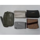 Four various Concorde wash bags and a Concorde leather wrist bag.