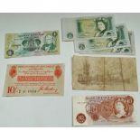 A George V ten shillings note, together with a George V one pound note, an Elizabeth II ten