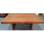 A large rosewood Art Deco style dining table on twin supports, length 186cm.